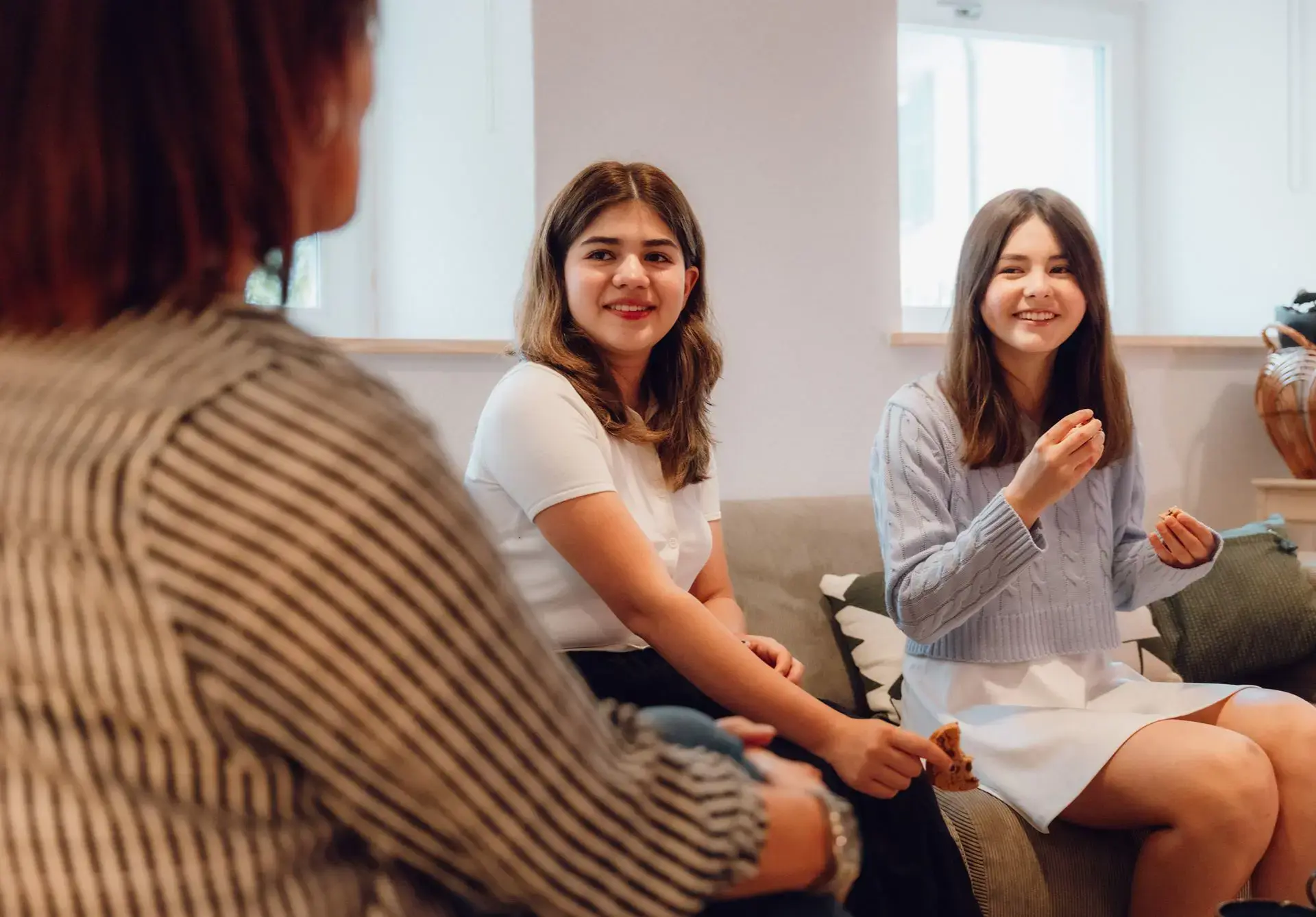 Students having a conversation with their teacher