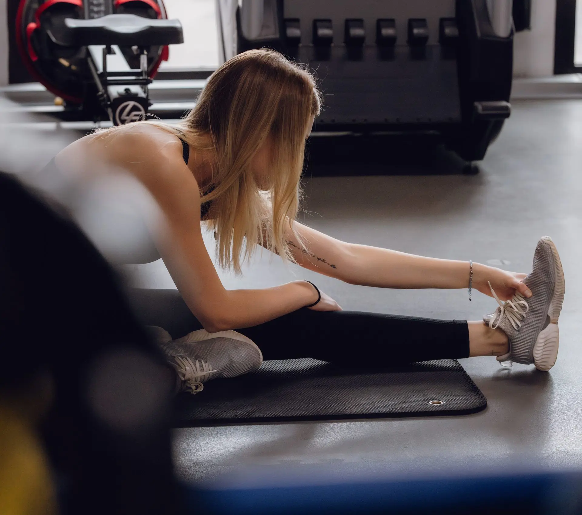 Student exercising in the campus gym