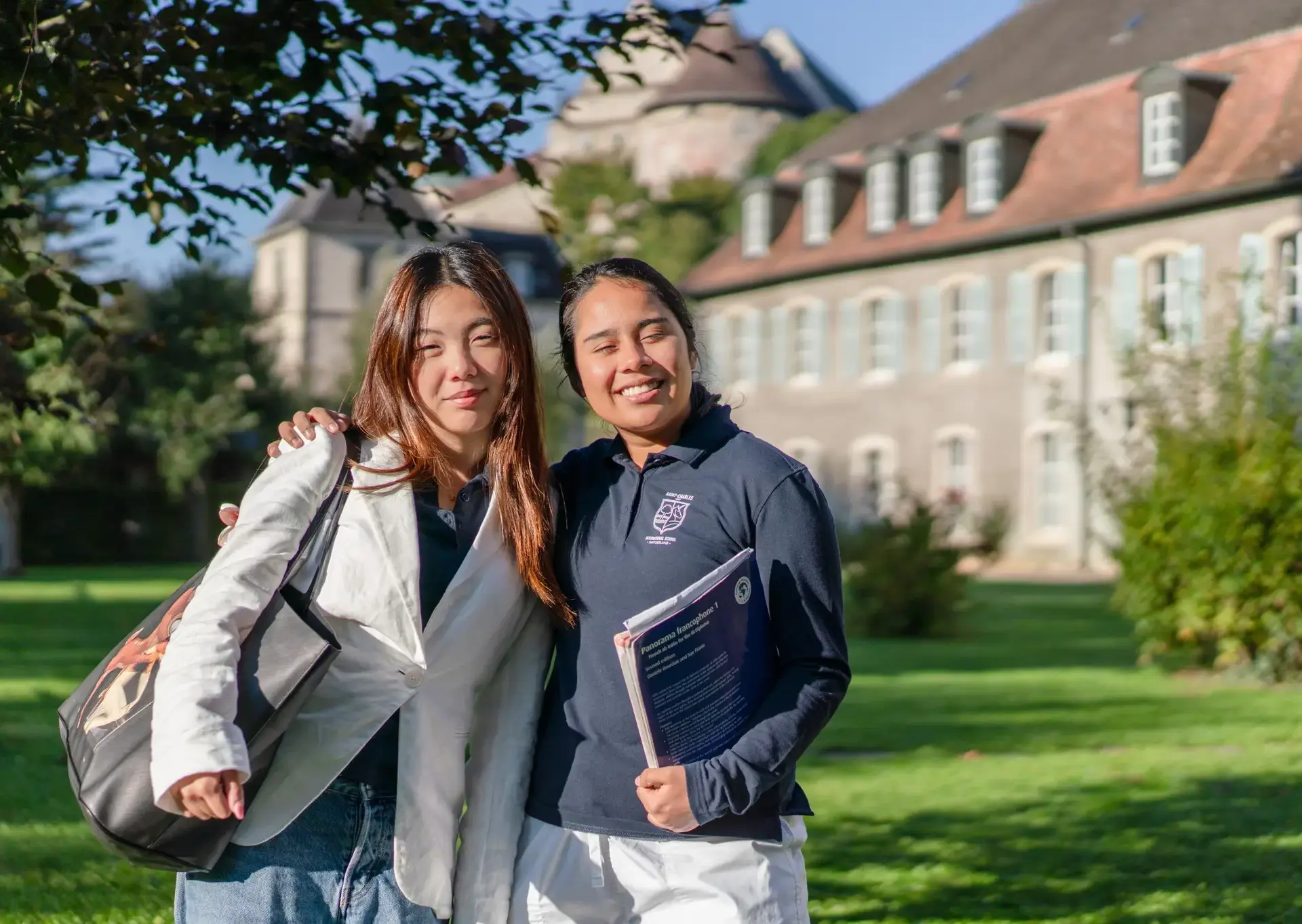 Students smiling together outdoors