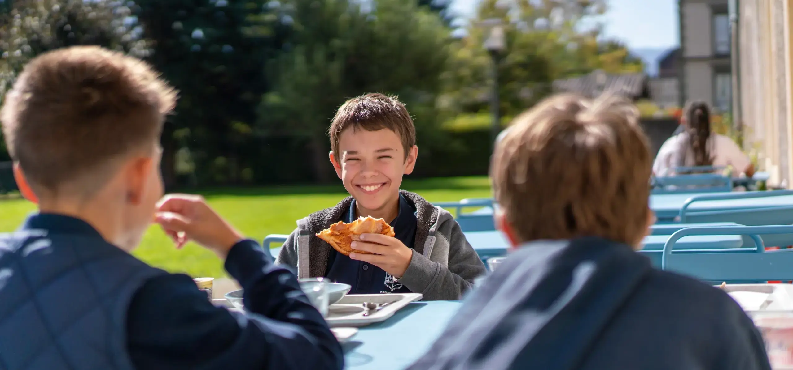 Students having lunch outdoors